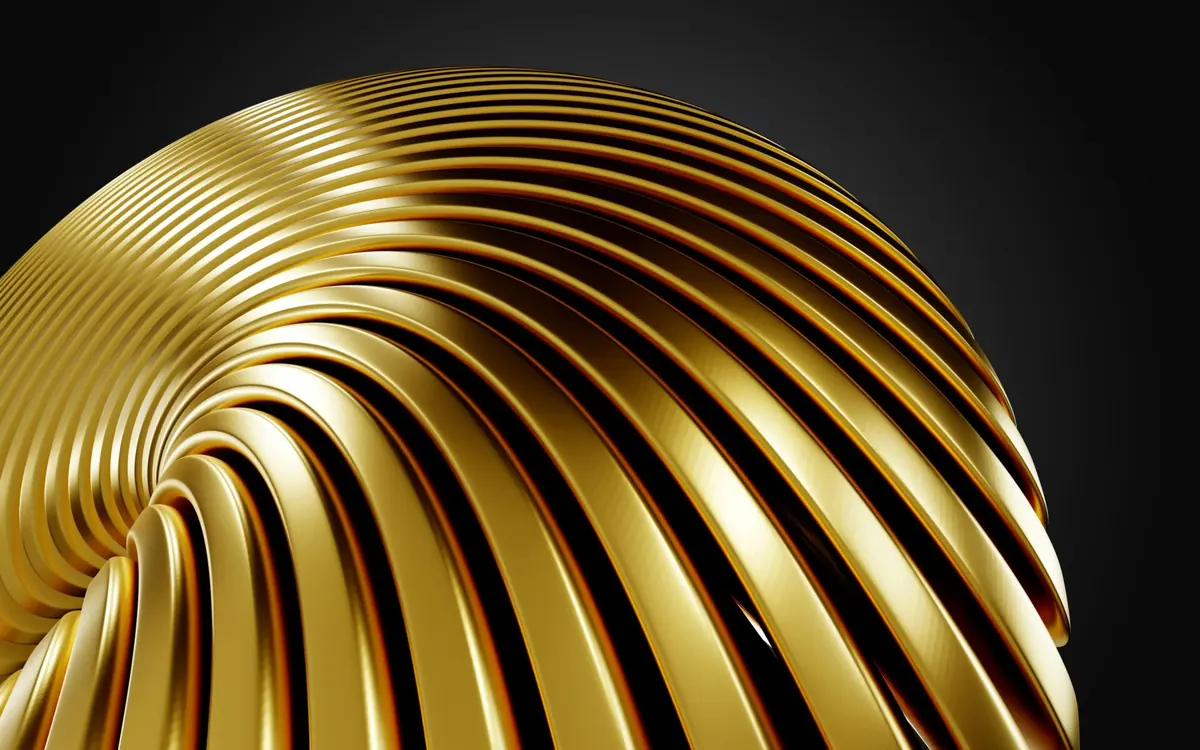 黒い背景に浮かぶ、金色の帯が渦を巻く立体造形